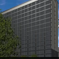 Modern High Rise Residential Building With Glass Curtain Walls And White Exterior Design