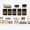 Various Kitchen Utensils Including Storage Boxes Coffee Cups Jars And Packaged Items In Neutral Tones