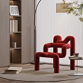 Modern Red Curved Accent Chair In Living Room With Floor Lamp Round Rug Side Table