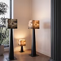 Modern Floor Lamps With Textured Lampshades In White Wall Room With Window Blinds And Plant