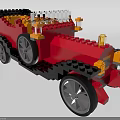 Lego Bricks Constructed Red Vintage Car with Black Yellow Accents Gray Wheels and Transparent Parts