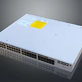White Network Switch With Multiple Ports Label And Yellow Warning Sticker
