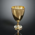 Elegant Golden Metal Cup As Stylish Household Item With Shiny Surface