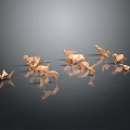 Decorative Ornament Set Featuring Copper Colored Origami Animal Figures On Black Smooth Surface With Reflections