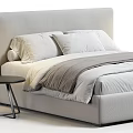 Modern Bedroom Bed With White Pillows Gray Blanket Light Headboard And Black Side Table