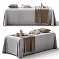 Cozy Massage Bed With Gray Bedspread Brown Blanket Soft Pillows And Folded Towels