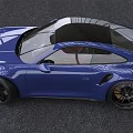 Blue Porsche Sports Car Coupe With Sleek Exterior Black Alloy Wheels And Red Leather Interior