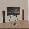 Modern TV Setup On Floor Stand With Speakers Wooden Floor Clock And Decor