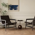 Modern Accent Chairs With Brown Leather Design Small Round Table Potted Plant And Wooden Floor