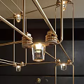 Modern Geometric Gold Metal Chandelier With Hanging Cube Grid And Illuminated Lights