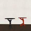Black And Red Modern Side Tables With Unique Leg Design On Wooden Floor