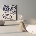 Comfortable Bean Bag Chair In Light Colored Interior With Wall Painting And Small Wooden Table