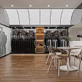Modern Clothing Store Interior With Hanging Clothes Racks Display Cabinet And Chairs
