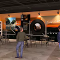 Casual Lounge Area With Seating Tables Chairs And Decorative Wall Art