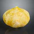 Fresh Yellow Round Pumpkin With Textured Skin On Dark Background