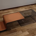 Sleek Modern Coffee Table With Black Metal Wire Frame And Orange Cushioned Top