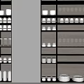 Stylish Tableware Set On Dark Kitchen Shelves With White Bowls Plates Mugs And Wine Glasses