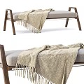 Wooden Frame Ottoman With Beige Fringed Knit Blanket And Light Gray Cushion