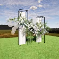Floral Installation With Black Frame Columns White Lavender Flowers Circular Decorations On Green Grassland