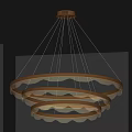 Elegant Modern Circular Pendant Light With Multiple Gold Rings Wavy Design And Soft Lighting