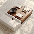 Modern Coffee Table Featuring Brown White Finish Open Drawer Decorative Tray And Books