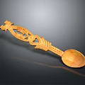 Wooden Carved Spoon with Intricate Dragon Pattern and Decorative Handle Design