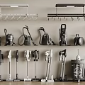 Various Daily Electrical Appliances Including Vacuum Cleaners And Cleaning Tools With Hanging Racks