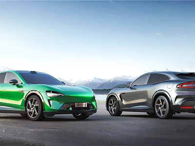 Sleek Green And Silver Modern Cars Parked On Road With Mountain Landscape And Blue Sky 3d model