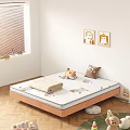 Cute Kids Bed with Cartoon Pattern Mattress and Stuffed Toys on Wooden Floor