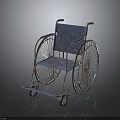 Blue Wheelchair With Metal Frame And Spoked Wheels On Dark Surface