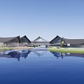 Modern Architectural Complex With Unique Roof Design And Waterfront Green Scenic Areas