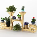 Wooden Multi Layer Plant Stand With Wheels Holding Various Green Potted Plants