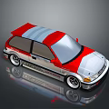 Red And Silver Racing Car With Rear Spoiler And Alloy Wheels