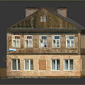 Two Story Residential Building With Brick Exterior Gray Roof Chimneys And White Windows