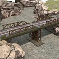 Scenic Truss Bridge Structure With Roadway And Rock Surroundings Near Grassland