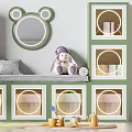 Green and White Entryway Cabinet Sideboard with Circular Cutout Design Mirror Books and Plant Nearby