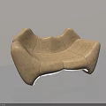 Modern Beige Leather Two Seater Sofa With Unique Curved Shape And Stitched Details