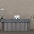 Modern Reception Desk With Wooden Slatted Design Dark Countertop Laptop Hanging Lamp And Green Plant