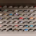 Various Colorful Shoes of Different Styles Neatly Arranged on Wall Racks