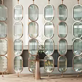 Modern Glass Room Divider With Oval Glass Panels And Brass Frame Interior Design