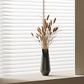 Stylish Gray Vase With Dried Pampas Grass On Light Colored Tabletop Against White Blinds