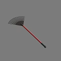 Garden Rake Hardware Tool with Black Tines Red Handle and Green Grip