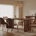 Modern Dining Room Setup With Wooden Table Chairs Cabinet Pendant Light Plant And Rug