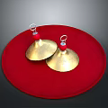 Two Golden Brass Cymbals Placed On Red Circular Pad Percussion Equipment
