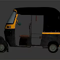 Yellow And Black Three Wheeled Auto Rickshaw With Open Cabin And Front Windshield