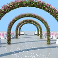 Wedding Venue Decorated With Multiple Flower Arches Pink Green Flowers White Chairs And Petals