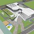 Modern Geometric Architecture Complex With Blue Roofs Sports Field And Surrounding Green Areas