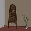 Modern Wooden Bookcase With Multiple Shelves And Decorative Items Near Green Plant
