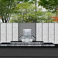 Modern Landscape Feature Wall With Central Water Fountain And Green Trees