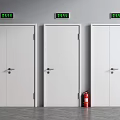 White Doors With Green Exit Signs And Red Fire Extinguisher In Corridor